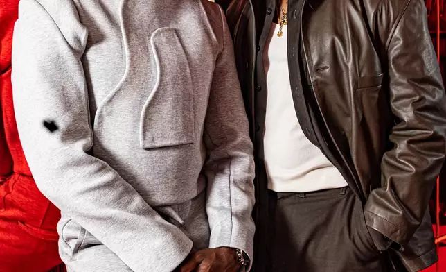 FILE - Sope Dirisu, star of the film "My Father's Shadow," left, poses with director Akinola Davies Jr. at the 78th international film festival in Cannes, southern France, on May 19, 2025. (Photo by Joel C Ryan/Invision/AP, File)