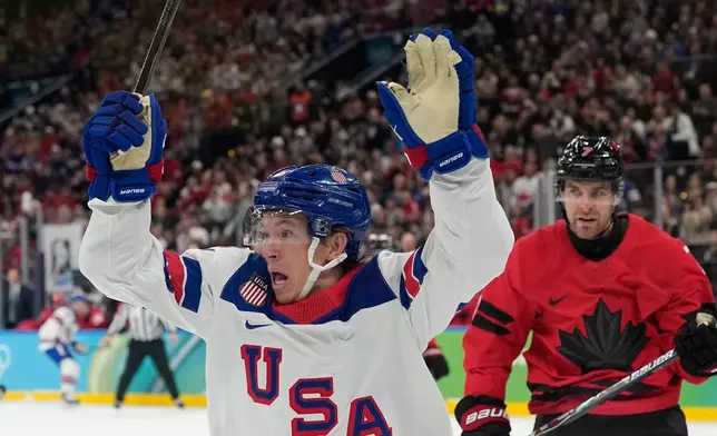 United States' Matt Boldy, celebrates after scoring the opening goal during a men's ice hockey gold medal game between Canada and the United States at the 2026 Winter Olympics, in Milan, Italy, Sunday, Feb. 22, 2026. (AP Photo/Hassan Ammar)