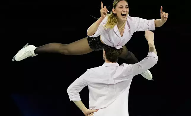 Sara Conti and Niccolo Macii of Italy perform during the figure skating exhibition at the 2026 Winter Olympics, in Milan, Italy, Saturday, Feb. 21, 2026. (AP Photo/Ashley Landis)