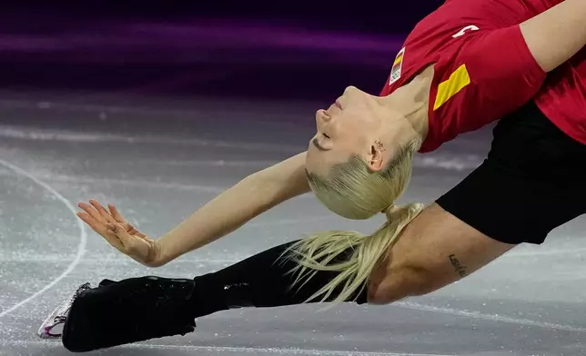 Olivia Smart and Tim Dieck of Spain perform during the figure skating exhibition at the 2026 Winter Olympics, in Milan, Italy, Saturday, Feb. 21, 2026. (AP Photo/Ashley Landis)