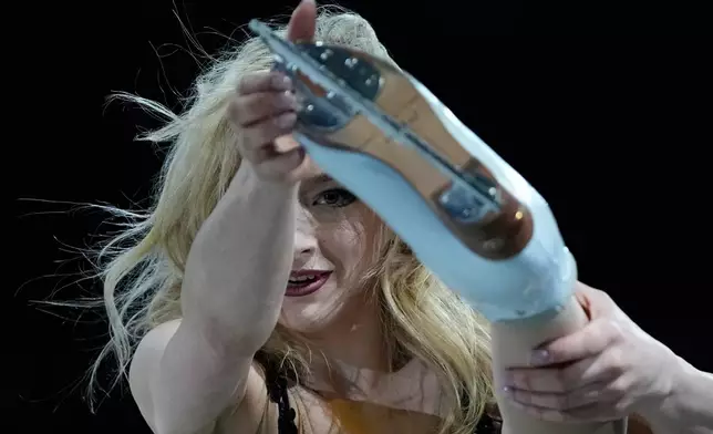 Amber Glenn of the United States performs during the figure skating exhibition at the 2026 Winter Olympics, in Milan, Italy, Saturday, Feb. 21, 2026. (AP Photo/Ashley Landis)