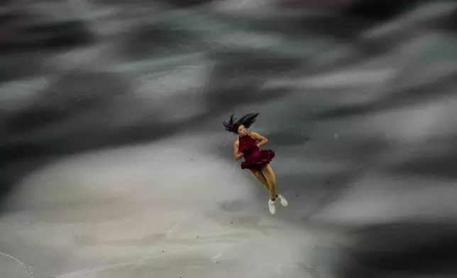 Ami Nakai of Japan performs during the figure skating exhibition at the 2026 Winter Olympics, in Milan, Italy, Saturday, Feb. 21, 2026. (AP Photo/Francisco Seco)