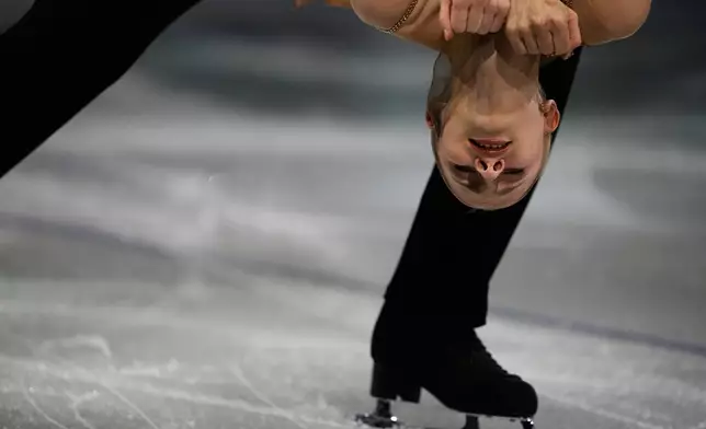 Fabienne Hase Minerva and Nikita Volodin of Germany perform during the figure skating exhibition at the 2026 Winter Olympics, in Milan, Italy, Saturday, Feb. 21, 2026. (AP Photo/Ashley Landis)