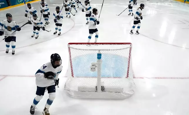 Finland players before a preliminary round match of women's ice hockey between United States and Finland at the 2026 Winter Olympics, in Milan, Italy, Saturday, Feb. 7, 2026. (AP Photo/Darko Bandic, Pool)