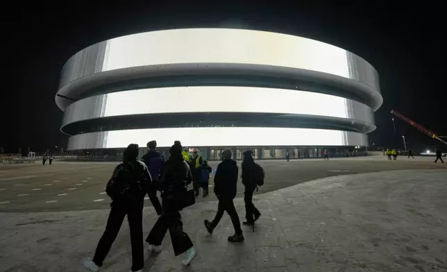 FILE - An outside view of the Santa Giulia Ice Hockey Arena, ahead of the 2026 Winter Olympics, in Milan, Italy, Friday, Jan. 9, 2026. (AP Photo/Luca Bruno, File)