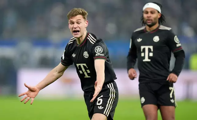 Munich's Joshua Kimmich reacts during the German Bundesliga soccer match between Hamburger SV and FC Bayern Munich in Hamburg, Germany, Saturday, Jan. 31, 2026. (Marcus Brandt/dpa via AP)