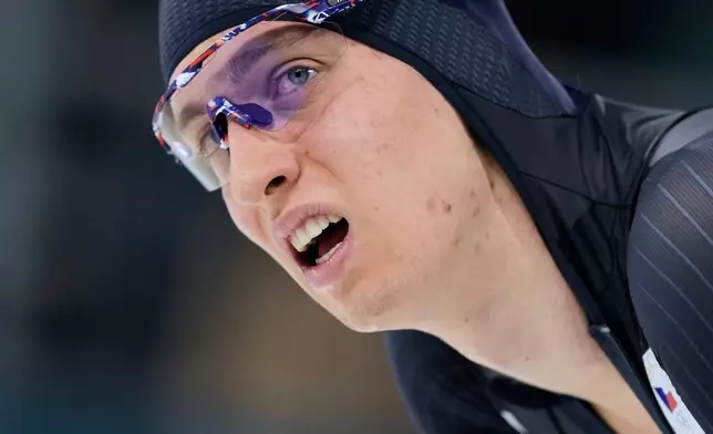 Metodej Jilek of Czechia catches his breath after competing in the men's 10,000 meters speedskating race at the 2026 Winter Olympics, in Milan, Italy, Friday, Feb. 13, 2026. (AP Photo/Luca Bruno)