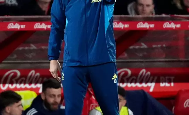 Nottingham Forest manager Sean Dyche reacts during the English Premier League soccer match between Nottingham Forest and Wolverhampton Wanderers, in Nottingham, England, Wednesday, Feb. 11, 2026. Mike Egerton/PA via AP)