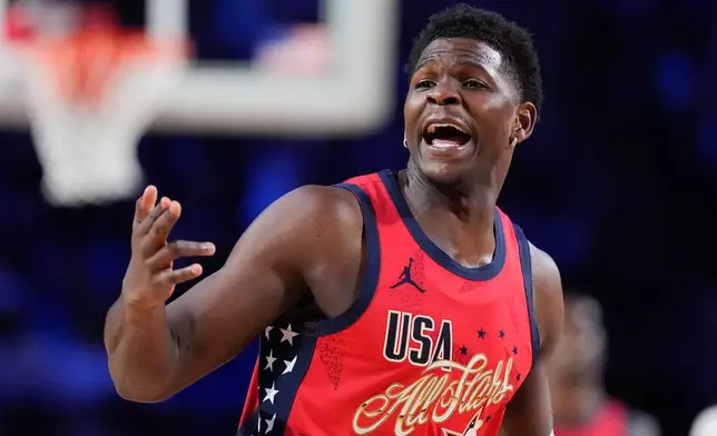 USA Stars guard Anthony Edwards reacts after scoring during the NBA All-Star basketball game against USA Stripes Sunday, Feb. 15, 2026, in Inglewood, Calif. (AP Photo/Mark J. Terrill)
