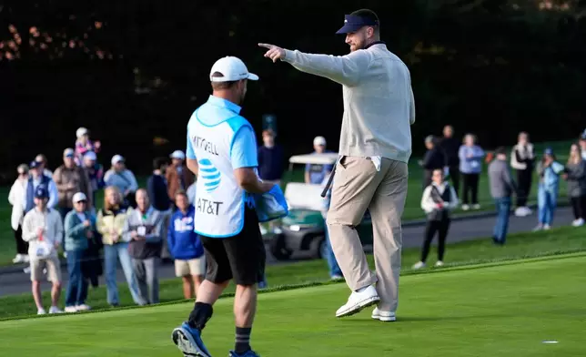 Kansas City Chiefs' Travis Kelce reacts after putting on the first hole at Pebble Beach Golf Links during the second round of the AT&amp;T Pebble Beach Pro-Am golf tournament in Pebble Beach, Calif., Friday, Feb. 13, 2026. (AP Photo/Godofredo A. Vásquez)