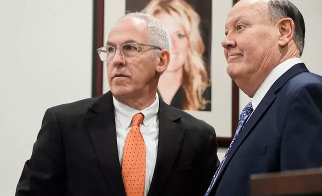 Defendants Michael Dowling and Chuck Jones wait for the start of their trial in Summit County Court of Common Pleas Judge Susan Baker Ross's courtroom on Tuesday, Feb. 3, 2026, in Akron, Ohio. (Mike Cardew/Akron Beacon Journal via AP, Pool)