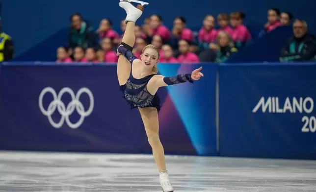 Amber Glenn of the United States competes during the figure skating women's team event at the 2026 Winter Olympics, in Milan, Italy, Sunday, Feb. 8, 2026. (AP Photo/Ashley Landis)