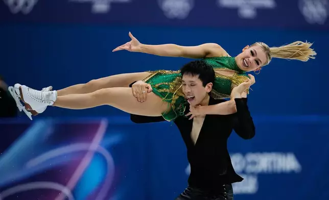 Holly Harris and Jason Chan of Australia compete during the rhythm dance in figure skating at the 2026 Winter Olympics, in Milan, Italy, Monday, Feb. 9, 2026. (AP Photo/Ashley Landis)