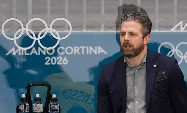 Sweden's Head Coach Ulf Lundberg gestures during a preliminary round match of women's ice hockey between France and Sweden at the 2026 Winter Olympics, in Milan, Italy, Sunday, Feb. 8, 2026. (AP Photo/Petr David Josek)