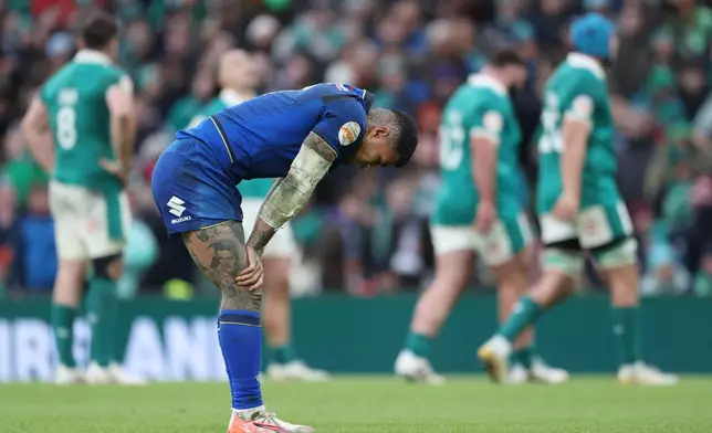 Italy's Monty Ioane reacts after the end of the Six Nations rugby union match between Ireland and Italy in Dublin, Ireland, Saturday, Feb. 14, 2026. (AP Photo/Peter Morrison)
