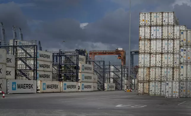 Containers sit at the Balboa terminal, run by CK Hutchison's Panama Ports Co., after Panama's government ordered the occupation of the port following a Supreme Court ruling that the concession was unconstitutional, in Panama City, Monday, Feb. 23, 2026. (AP Photo/Matias Delacroix)