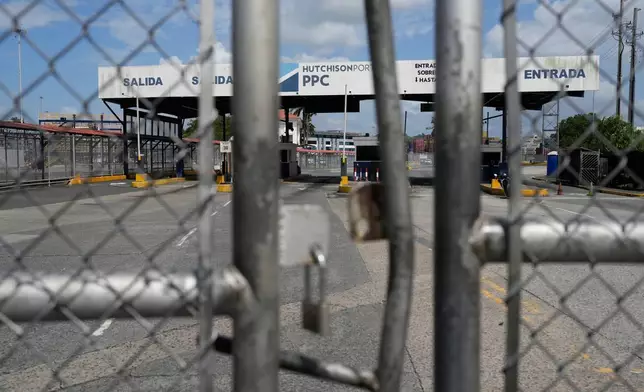 An entrance to the Balboa terminal, run by CK Hutchison's Panama Ports Co., is closed after Panama government ordered the occupation of the port following a Supreme Court ruling that the concession was unconstitutional in Panama City, Monday, Feb. 23, 2026. (AP Photo/Matias Delacroix)
