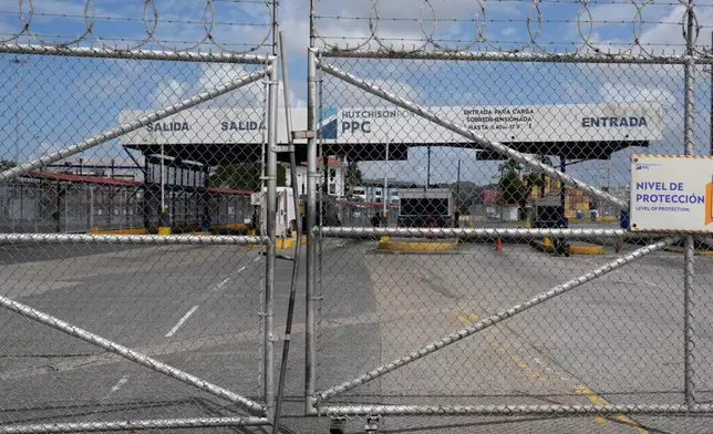 An entrance to the Balboa terminal, run by CK Hutchison's Panama Ports Co., is closed after Panama's government ordered the occupation of the port following a Supreme Court ruling that the concession was unconstitutional in Panama City, Monday, Feb. 23, 2026. (AP Photo/Matias Delacroix)