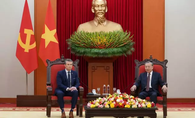 FILE - U.S. Defense Secretary Pete Hegseth, left, and General Secretary of Vietnam's Communist Party To Lam talk during a meeting in Hanoi, Vietnam, Nov. 2, 2025. (AP Photo/Hau Dinh, File)