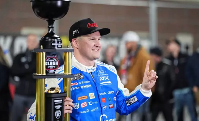 Ryan Preece celebrates in Victory Lane after winning NASCAR's The Clash preseason auto race, Wednesday, Feb. 4, 2026, in Winston-Salem, N.C. (AP Photo/Matt Kelley)