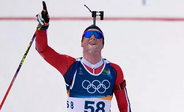 Johan-Olav Botn, of Norway, reacts after finishing the men's 20-kilometer individual biathlon race at the 2026 Winter Olympics in Anterselva, Italy, Tuesday, Feb. 10, 2026. (AP Photo/Andrew Medichini)