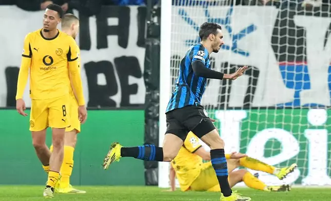 Atalanta's Davide Zappacosta celebrates after scoring their second goal during the Champions League second leg playoff match between Atalanta and Borussia Dortmund in Bergamo, Italy, Wednesday, Feb. 25, 2026. (Spada/LaPresse via AP)
