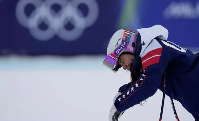 United States' Jacqueline Wiles concentrates during a race inspection ahead of an alpine ski, women's downhill official training, at the 2026 Winter Olympics, in Cortina d'Ampezzo, Italy, Friday, Feb. 6, 2026. (AP Photo/Giovanni Auletta)