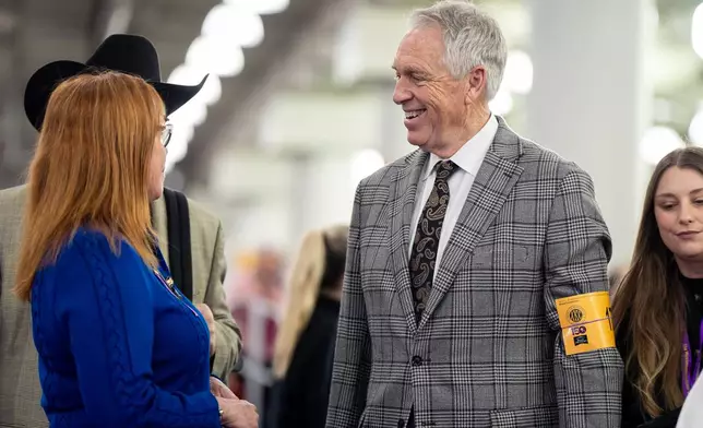 Bill McFadden, a seasoned dog handler, socializes at the 150th Westminster Kennel Club Dog Show, Monday, Feb. 2, 2026, in New York. (AP Photo/Angelina Katsanis)
