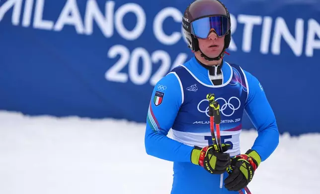 Italy's Giovanni Franzoni at the finish area, during the alpine ski, men's downhill first official training, at the 2026 Winter Olympics, in Bormio, Italy, Wednesday, Feb. 4, 2026. (AP Photo/Pier Marco Tacca)