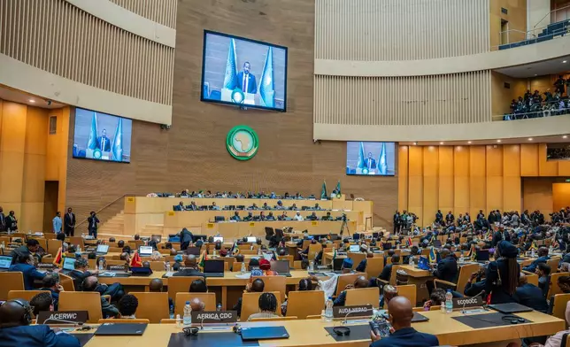 Ethiopia's Prime Minister Abiy Ahmed Ali delivers a speech during the second Italy-Africa Summit at the Addis International Convention Center in Addis Ababa, Ethiopia, Saturday, Feb. 14, 2026. (AP Photo/Amanuel Sileshi)