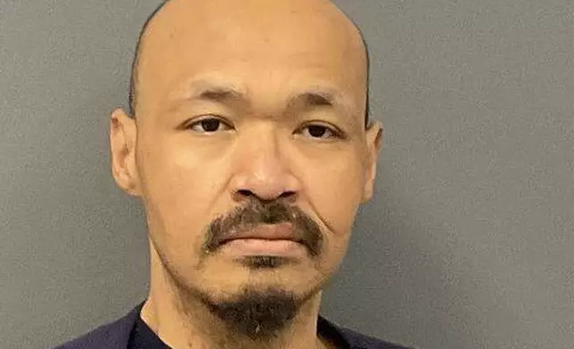 This 2024 booking photo provided by the Clay County Sheriff’s Office in Moorhead, Minn., shows Cory Allen McKay, who has several felony convictions for violent offenses. (Clay County Sheriff’s Office via AP)