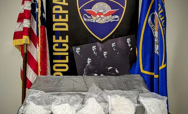 Police in Moorhead, Minn., display nearly 10 pounds of highly pure methamphetamine that investigators say they seized from the apartment of Cory Allen McKay on June 12, 2024. (Moorhead Police Department via AP)