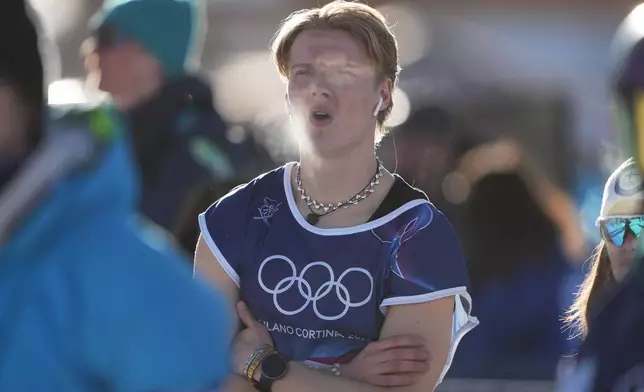 Finland's Kuura Koivisto looks on during men's freestyle skiing slopestyle qualifications at the 2026 Winter Olympics, in Livigno, Italy, Saturday, Feb. 7, 2026. (AP Photo/Lindsey Wasson)