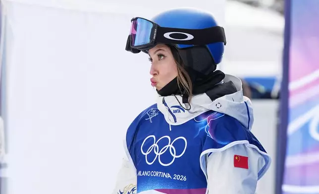 China's Eileen Gu reacts during the women's freestyle skiing slopestyle finals at the 2026 Winter Olympics, in Livigno, Italy, Monday, Feb. 9, 2026. (AP Photo/Gregory Bull)