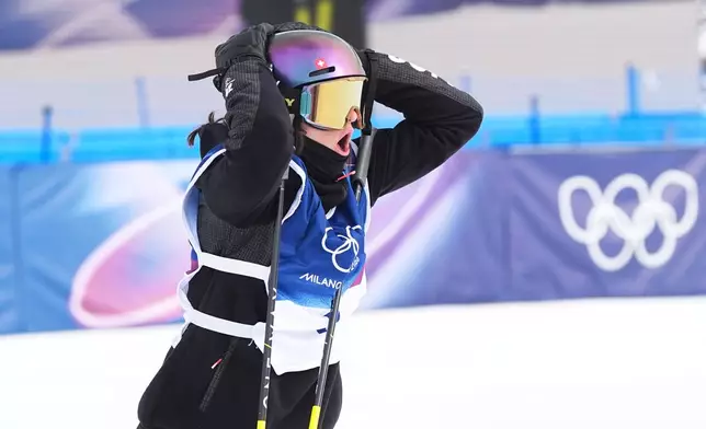 Switzerland's Mathilde Gremaud reacts during the women's freestyle skiing slopestyle finals at the 2026 Winter Olympics, in Livigno, Italy, Monday, Feb. 9, 2026. (AP Photo/Gregory Bull)