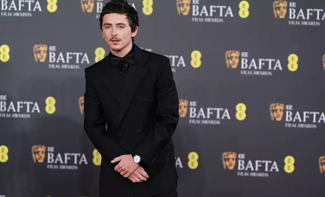 Timothee Chalamet poses for photographers upon arrival at the 79th British Academy Film Awards, BAFTA's, in London, Sunday, Feb. 22, 2026. (AP Photo/Alberto Pezzali)