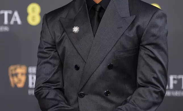 Michael B. Jordan poses for photographers upon arrival at the 79th British Academy Film Awards, BAFTA's, in London, Sunday, Feb. 22, 2026. (AP Photo/Alberto Pezzali)