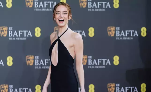 Emma Stone poses for photographers upon arrival at the 79th British Academy Film Awards, BAFTA's, in London, Sunday, Feb. 22, 2026. (AP Photo/Alberto Pezzali)