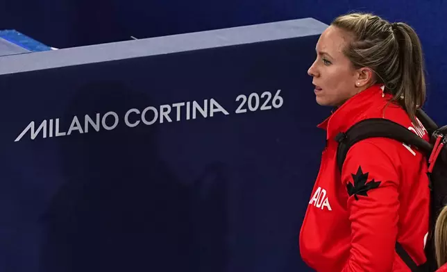 Canada's Rachel Homan leaves following a women's curling semifinal match against Sweden at the 2026 Winter Olympics, in Cortina d'Ampezzo, Italy, Friday, Feb. 20, 2026. (AP Photo/Fatima Shbair)