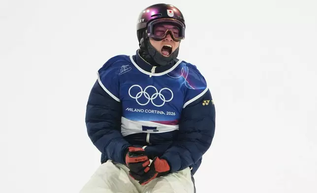 Japan's Kira Kimura reacts during the men's snowboarding big air finals at the 2026 Winter Olympics, in Livigno, Italy, Saturday, Feb. 7, 2026. (AP Photo/Lindsey Wasson)