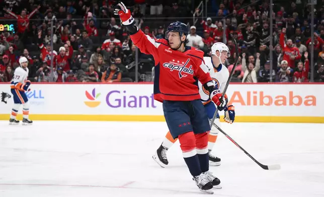 Washington Capitals defenseman Martin Fehérváry (42) celebrates his goal during the second period of an NHL hockey game against the New York Islanders, Monday, Feb. 2, 2026, in Washington. (AP Photo/Nick Wass)