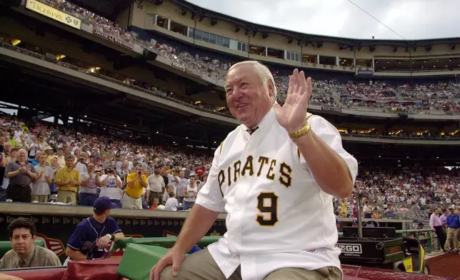 FILE - Pittsburgh Pirates Hall of Fame second baseman Bill Mazeroski makes a victory lap around PNC Park in Pittsburgh during a ceremony celebrating his induction into the hall. (AP Photo/Gene J.Puskar, File)