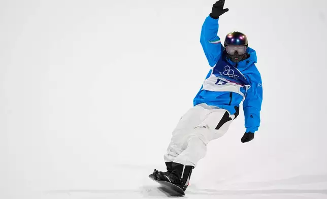 Italy's Ian Matteoli reacts during men's snowboard big air qualifications at the 2026 Winter Olympics, in Livigno, Italy, Thursday, Feb. 5, 2026. (AP Photo/Abbie Parr)