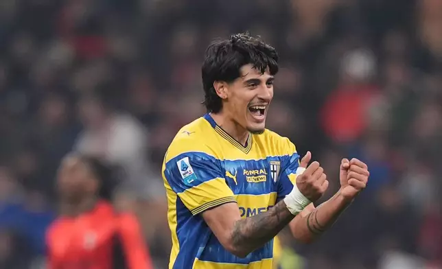 Parma's Mariano Troilo celebrates scoring during the Italian Serie A soccer match between AC Milan and Parma in Milan, Italy, Sunday, Feb. 22 , 2025. (Spada/LaPresse via AP)