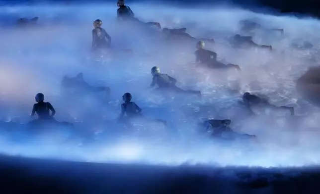 Artists perform during the closing ceremony of the 2026 Winter Olympics, in Verona, Italy, Sunday, Feb. 22, 2026. (AP Photo/Antonio Calanni)