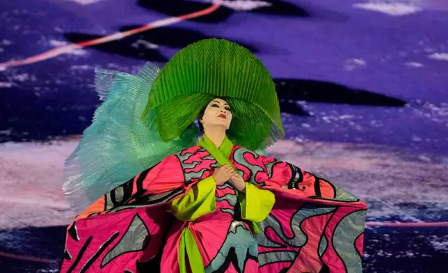 An artist performs during the closing ceremony of the 2026 Winter Olympics, in Verona, Italy, Sunday, Feb. 22, 2026. (AP Photo/Ashley Landis)