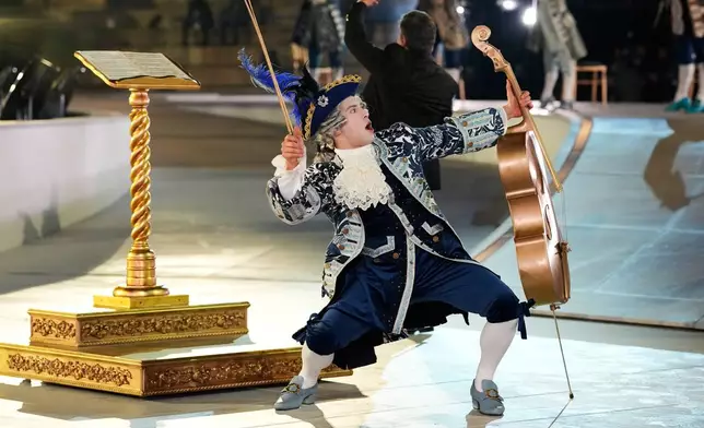A performer participates in the closing ceremony of the 2026 Winter Olympics, in Verona, Italy, Sunday, Feb. 22, 2026. (AP Photo/Natacha Pisarenko)