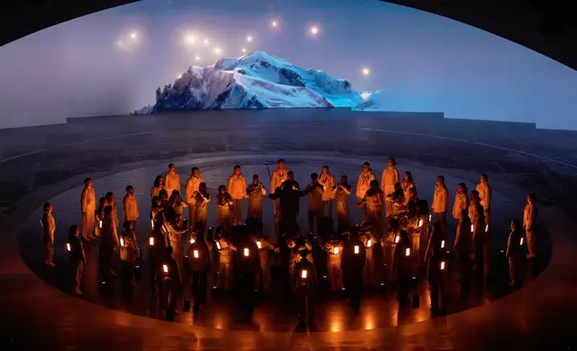 Artists perform during the closing ceremony of the 2026 Winter Olympics, in Verona, Italy, Sunday, Feb. 22, 2026. (AP Photo/Bernat Armangue)