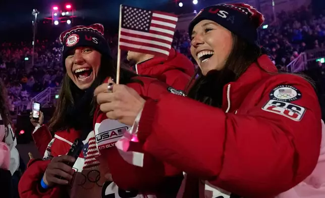 Athletes from the United States attend the closing ceremony of the 2026 Winter Olympics, in Verona, Italy, Sunday, Feb. 22, 2026. (AP Photo/Natacha Pisarenko)