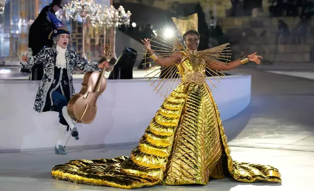 Performers participate in the closing ceremony of the 2026 Winter Olympics, in Verona, Italy, Sunday, Feb. 22, 2026. (AP Photo/Natacha Pisarenko)